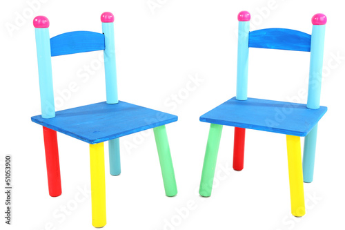 Photo: Small and colorful chairs for little kids isolated on white Small and colorful chairs for little kids isolated on white