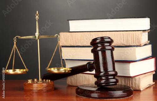 Photo: Wooden gavel, golden scales of justice and books Wooden gavel, golden scales of justice and books