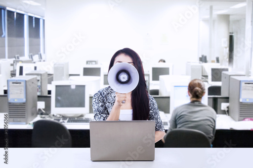Photo: Businesswoman announce meeting Businesswoman announce meeting