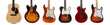 Group of six guitars on white background