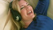 Woman listening to music with headphones