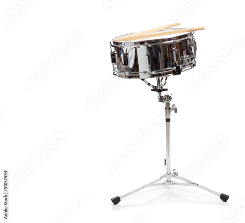 Photo: A snare drum on a white background A snare drum on a white background