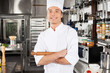 Happy Male Chef In Kitchen