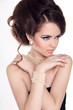 Pearls. Beautiful woman with evening make-up. Jewelry and Beauty