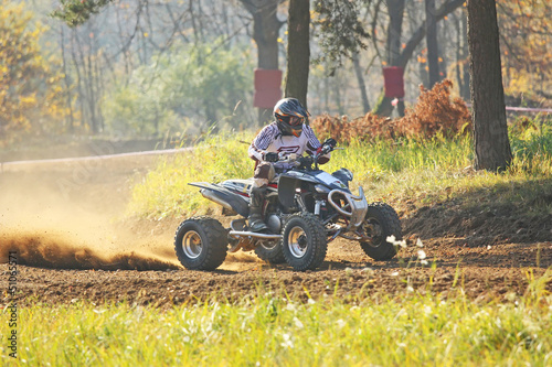 Photo: Quad rider in autumn forest Quad rider in autumn forest
