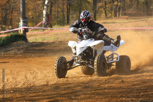 Photo: Front view of quad motorbike rider Front view of quad motorbike rider
