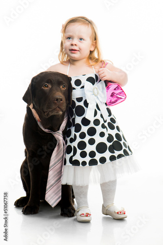 Photo: little girl with retriever little girl with retriever