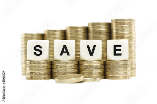 Photo: SAVE on gold coins on white background SAVE on gold coins on white background