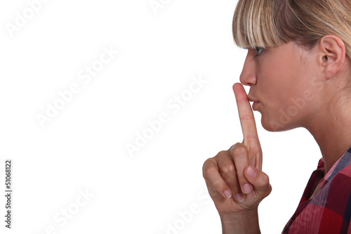 Photo: woman asking for silence woman asking for silence