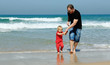 father and daughter on the beach