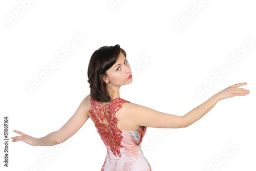 Photo: Portrait of beautiful brunette with raised open hands Portrait of beautiful brunette with raised open hands