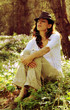 Foto: Beautiful 35 years old woman in spring forest Beautiful 35 years old woman in spring forest