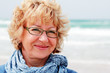 Photo: Portrait of happy senior woman at sea Portrait of happy senior woman at sea