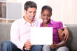 Foto: Couple watching laptop screen Couple watching laptop screen