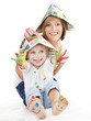 Cute boy and his mother have coloured hands