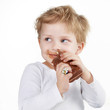 Cute little boy with chocolate