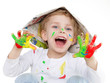 Cute little boy with coloured hands cheers for fun