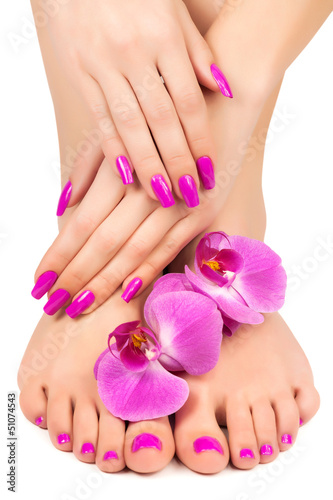 Photo: pink manicure and pedicure with a orchid flower pink manicure and pedicure with a orchid flower