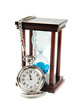 hourglass and a pocket watch