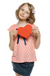 Little girl holding heart shape