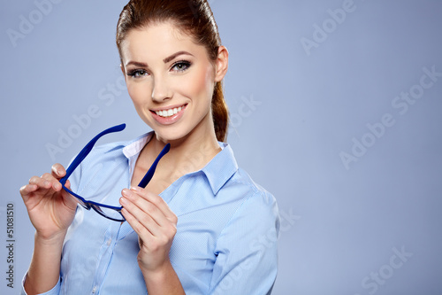 Photo: Cute young business woman with glasses Cute young business woman with glasses