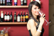 Woman toasting red wine in a restaurant
