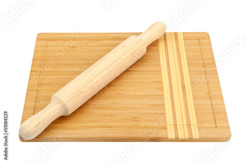 Photo: brbreadboard and rolling pin isolated on white background brbreadboard and rolling pin isolated on white background