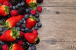 Berries on Wooden Background