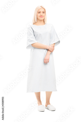 Photo: Full length portrait of a female patient posing in a hospital go Full length portrait of a female patient posing in a hospital go