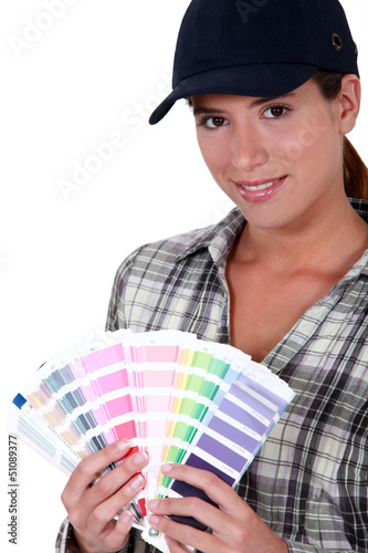 Photo: Painter holding a spectrum of colour samples Painter holding a spectrum of colour samples