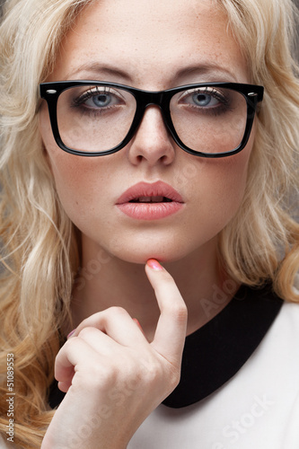 Photo: portrait of blonde woman wearing eyeglasses portrait of blonde woman wearing eyeglasses