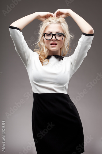 Photo: portrait of blonde woman wearing eyeglasses portrait of blonde woman wearing eyeglasses