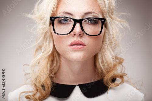 Photo: portrait of blonde woman wearing eyeglasses portrait of blonde woman wearing eyeglasses