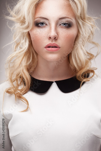 Photo: portrait of blonde woman wearing eyeglasses portrait of blonde woman wearing eyeglasses
