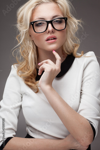 Photo: portrait of blonde woman wearing eyeglasses portrait of blonde woman wearing eyeglasses