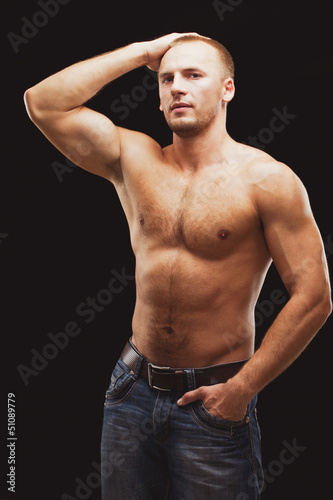 Photo: man excersizing with dumbbells man excersizing with dumbbells