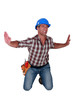 Foto: Man forcing invisible walls apart Man forcing invisible walls apart