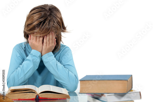 Photo: Child revising Child revising