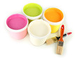 Paint pots and brushes isolated on white