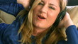 Woman listening to music with headphones
