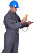 Electrician with voltmeter