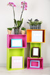 Beautiful colorful shelves with different home related objects