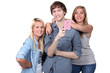 girls and boy holding driving license