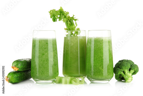 Photo: Glasses of green vegetable juice, isolated on white Glasses of green vegetable juice, isolated on white
