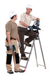 Two handymen at work.