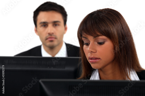 Photo: Employees sitting in front of their computers Employees sitting in front of their computers
