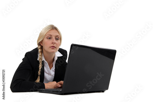 Photo: Uninterested blond office worker Uninterested blond office worker