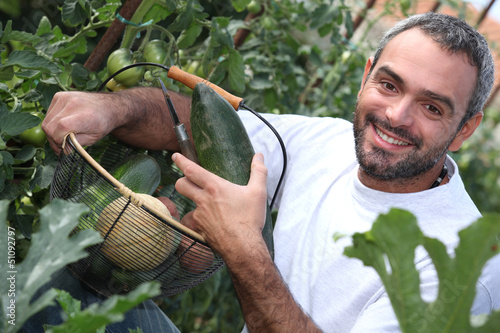 Photo: man with vegetable basket man with vegetable basket