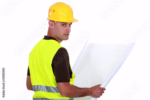 Photo: Engineer with plans Engineer with plans