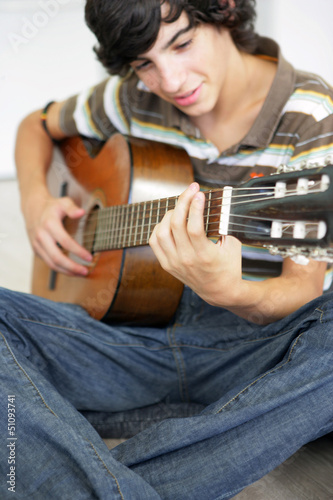 Photo: Teen with classical guitar Teen with classical guitar